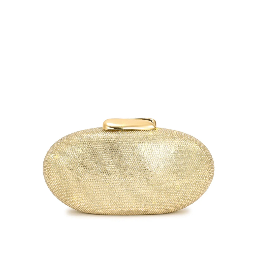 Vista frontal da bolsa clutch Melissa dourada, destacando o formato oval estruturado e a superfície cravejada de pedrarias brilhantes. Preto Dourado