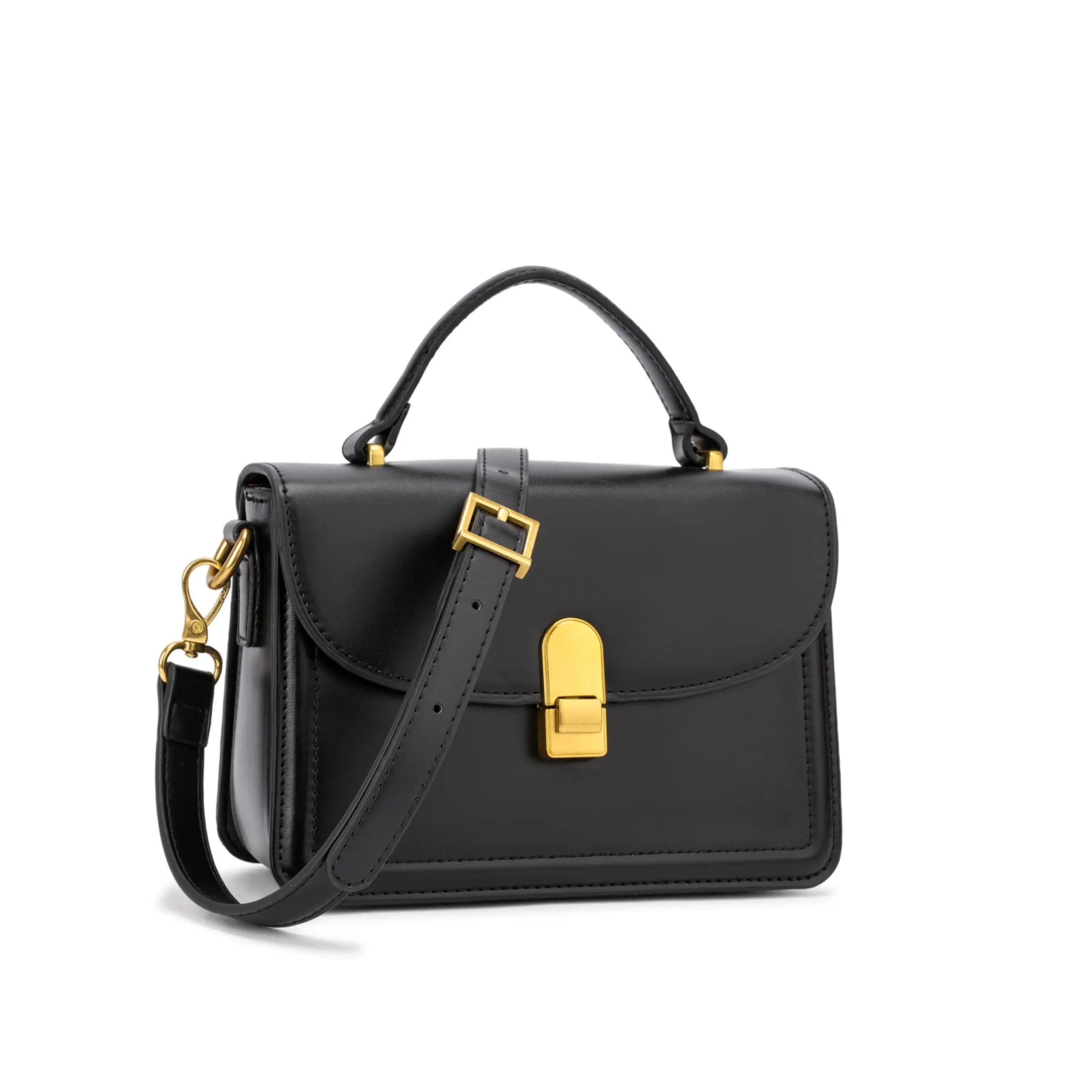 Bolsa de mão Livia na cor preta, com design estruturado elegante, alça dupla (curta de mão e longa ajustável) e fecho metálico dourado na tampa frontal. Preto Caramelo Off White Vermelho