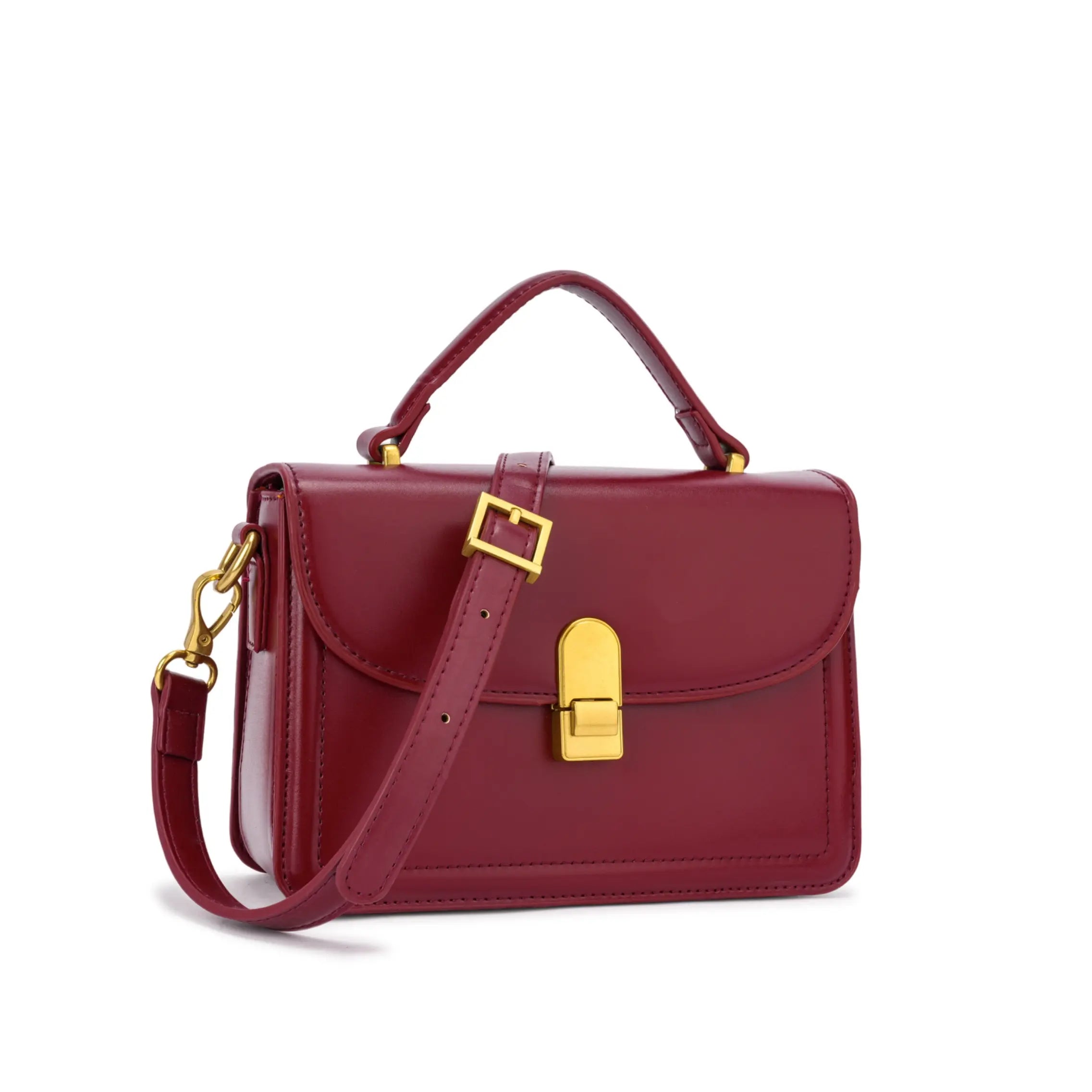 Bolsa de mão Livia estruturada na cor vinho bordô, vista frontal mostrando o acabamento liso e sofisticado, a alça tiracolo ajustável e a alça de mão. Preto Caramelo Off White Vermelho